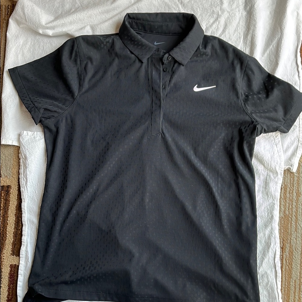 Nike Golf Women’s Black Polo shirt.
